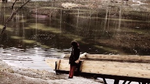 Кадр из фильма «At the bottom of the city»